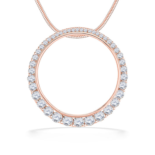 Diamond-accented circular pendant with open center set in rose gold, attached to chain by hidden bail. Item No. 44528